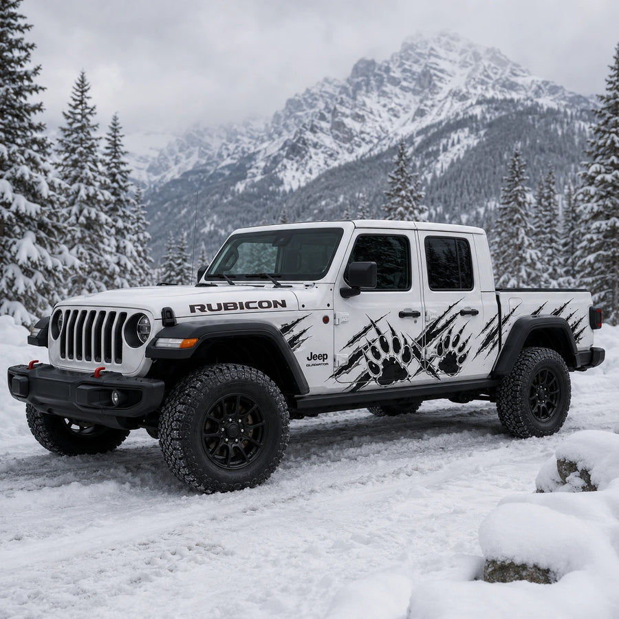 Jeep Gladiator Rubicon bear claw scratch decal – front 3/4 view in snowy alpine mountain setting