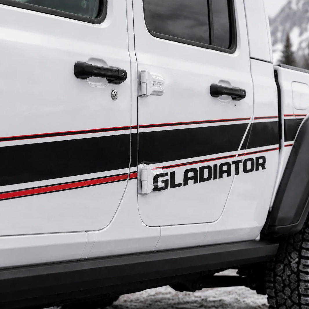 Jeep Gladiator Rubicon sport stripe decal – close-up door panel black red GLADIATOR stripe detail in snow