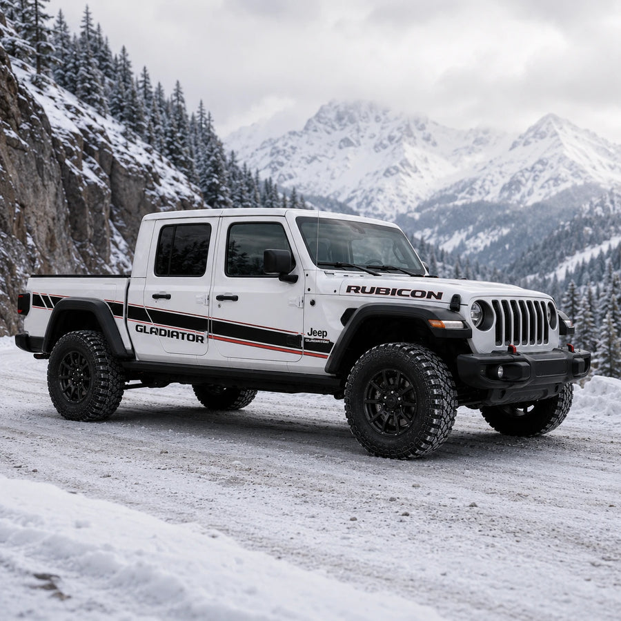 Jeep Gladiator Rubicon sport stripe decal kit – front 3/4 view on snowy mountain canyon road