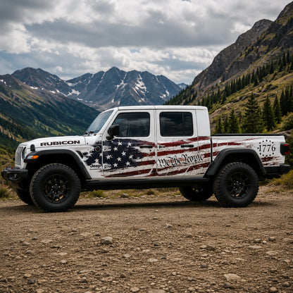 Jeep Gladiator Rubicon We The People 1776 American flag decal – full driver side view on rocky mountain gravel road