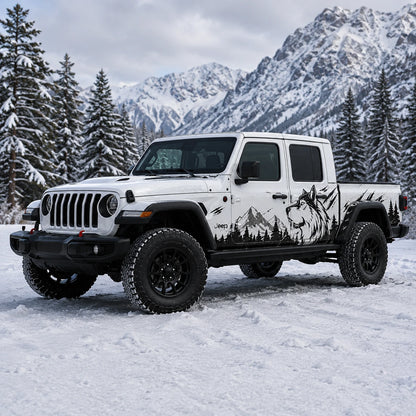 Jeep Gladiator Rubicon wolf mountain decal kit – front 3/4 view in snowy pine forest setting