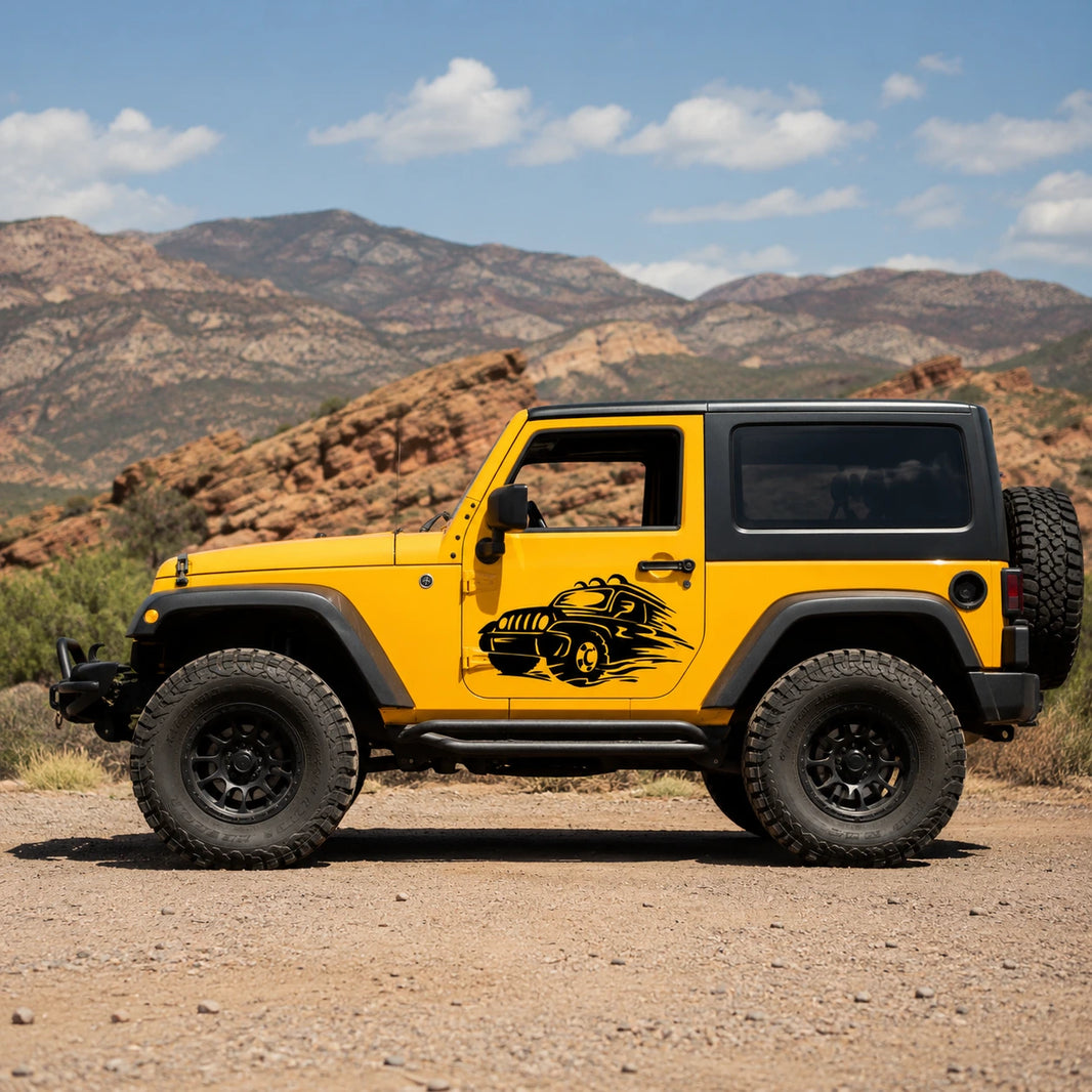 Jeep off-road speed graphic vinyl decal installed on yellow Jeep Wrangler 2-door side full view in desert landscape