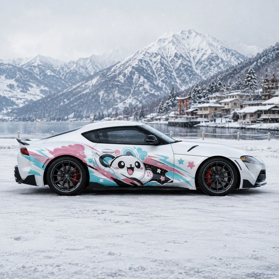 White Toyota Supra GR with kawaii panda car side decal – full side profile by snowy Japanese alpine mountain lake