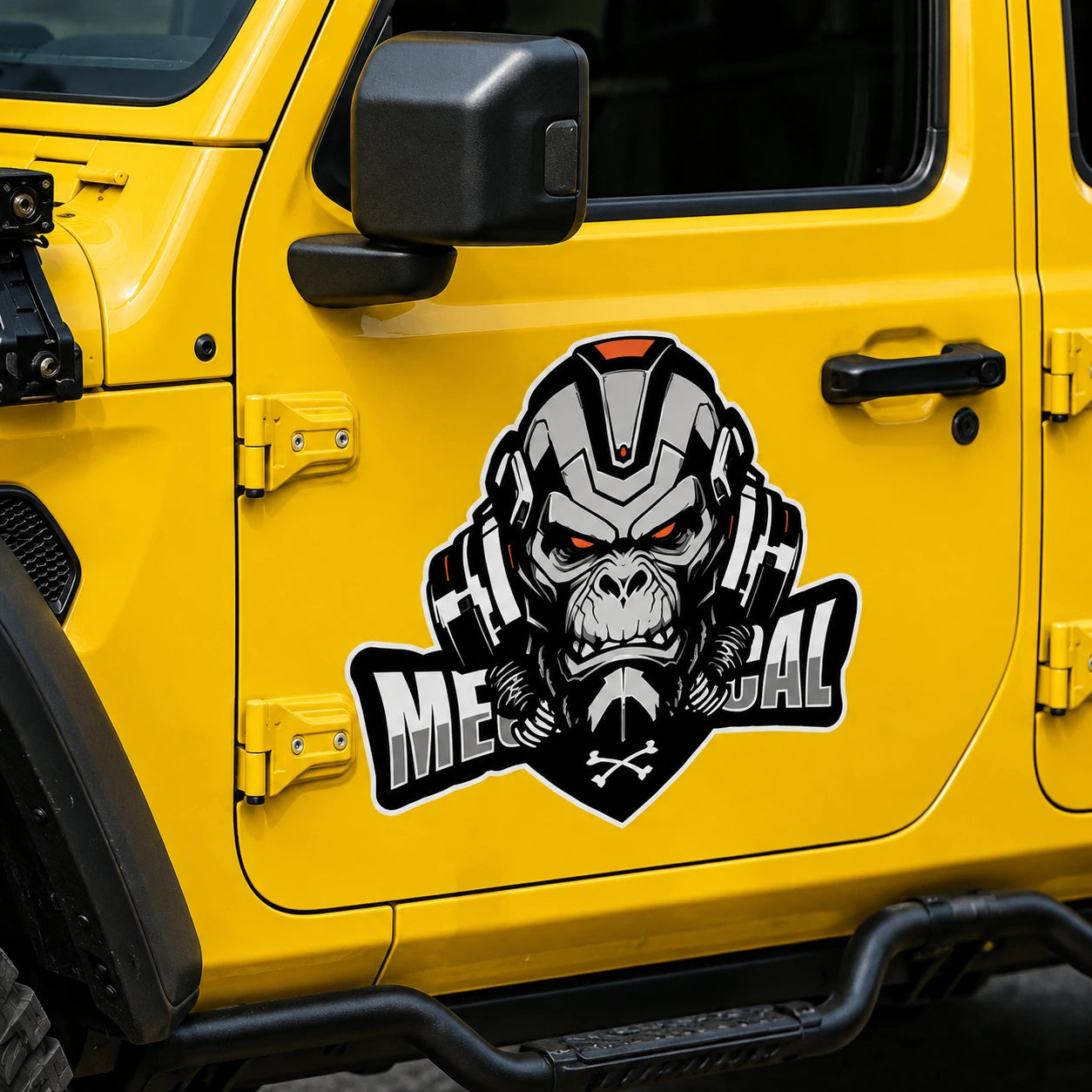 Mechanical Gorilla vinyl decal sticker on yellow Jeep Wrangler door close up