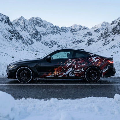 Oni demon samurai vinyl car side decal on black BMW M4 – full side profile in snowy mountain setting