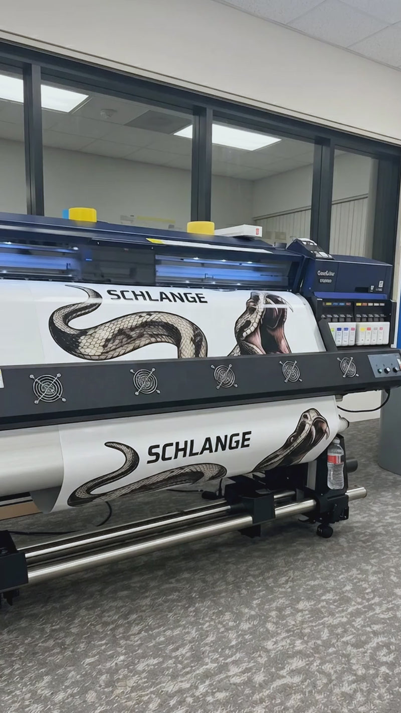 Large format printer outputting SCHLANGE custom snake graphic vehicle decal — professional car wrap printing process by WEEM Custom