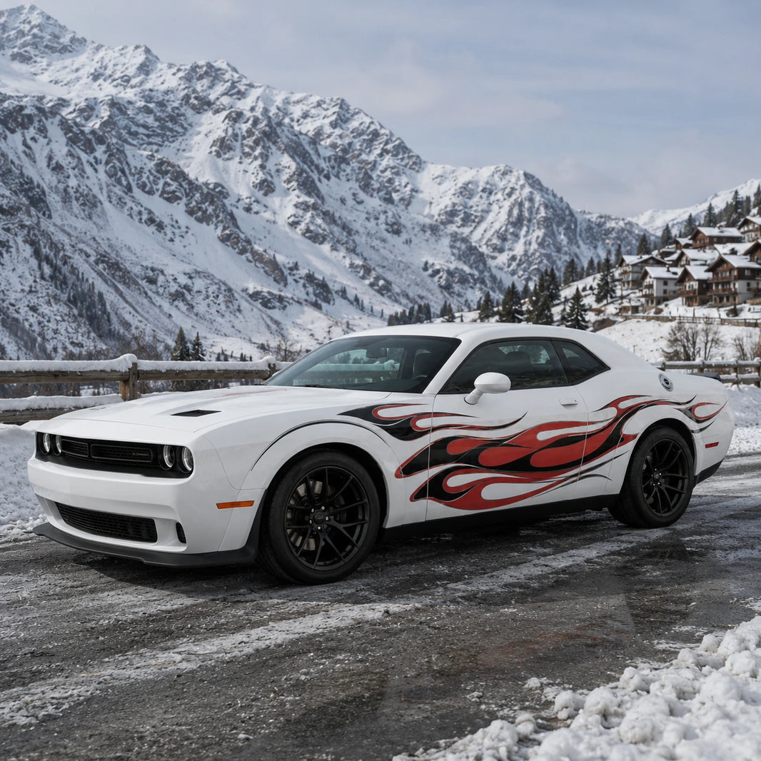 Red flame side decal on white Dodge Challenger front three quarter view alpine mountain