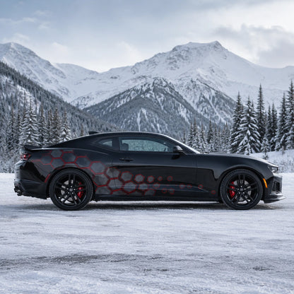 Black Chevrolet Camaro ZL1 with red honeycomb hex side decal – full side profile in snowy alpine mountain setting