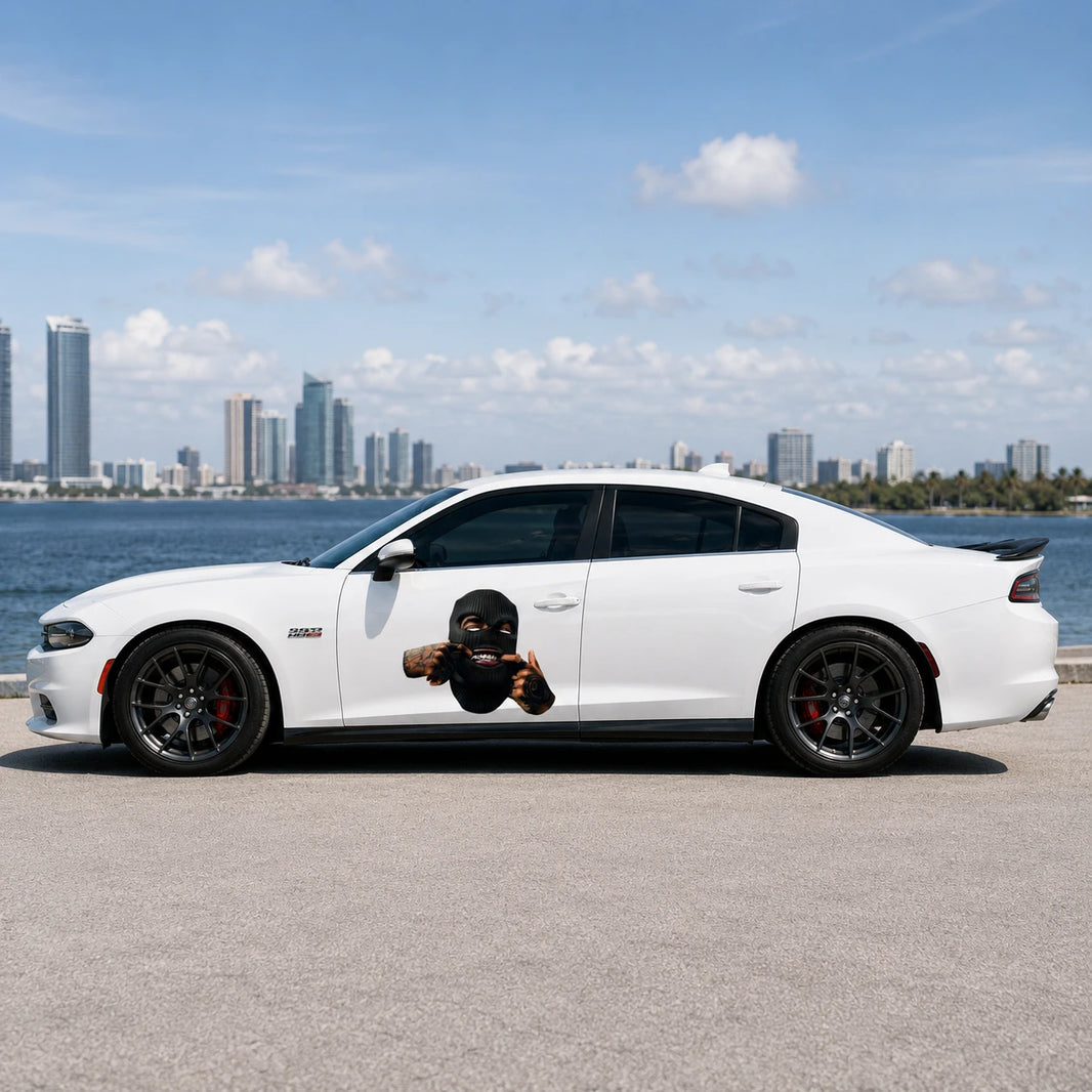 Ski mask tattooed hands vinyl decal installed on white Dodge Charger rear door full side view by waterfront city skyline