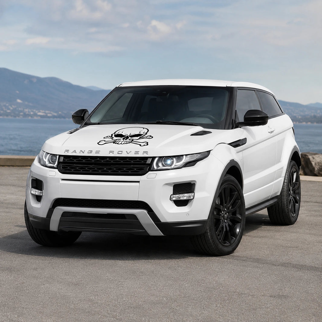 Skull and crossbones vinyl decal installed on white Range Rover Evoque hood full front three-quarter view by seaside