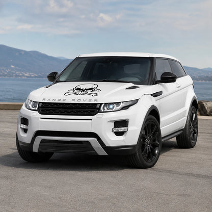 Skull and crossbones vinyl decal installed on white Range Rover Evoque hood full front three-quarter view by seaside