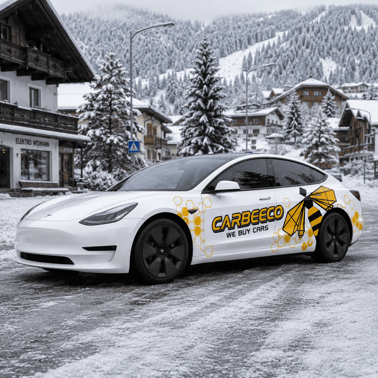 Tesla Model 3 with yellow and black bee theme honeycomb side decal parked in snowy alpine village