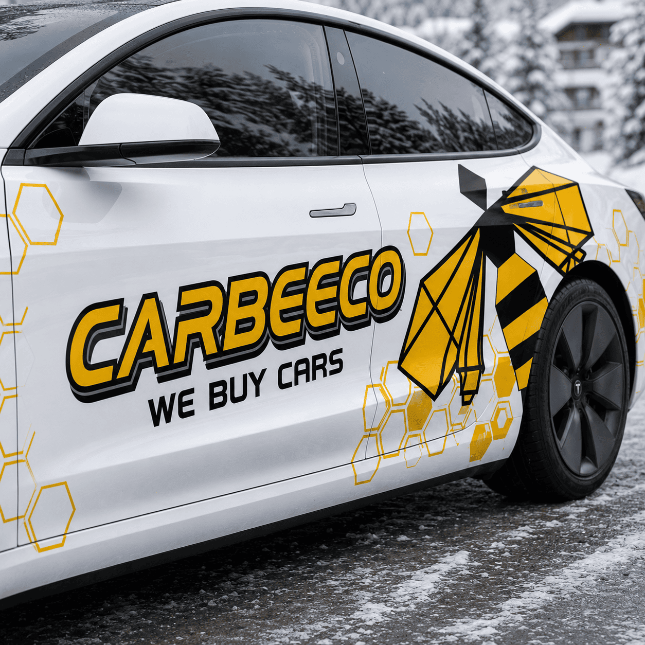 Close-up of Tesla Model 3 bee theme side decal showing geometric honeybee and honeycomb vinyl detail in snow
