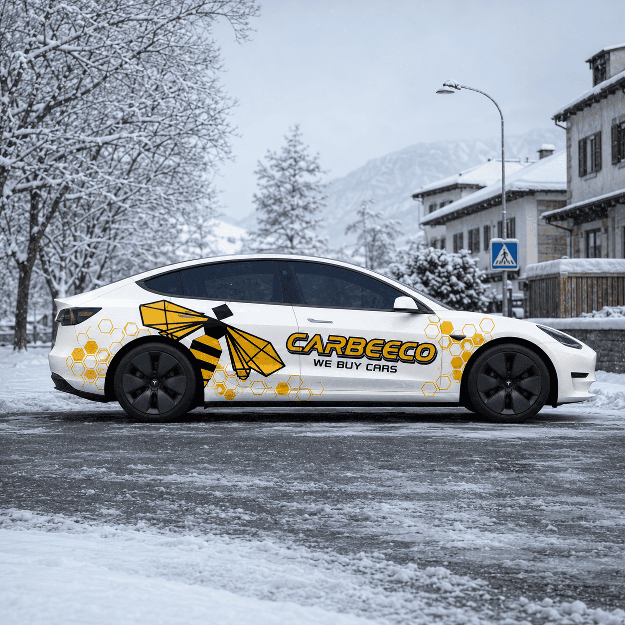 Tesla Model 3 bee theme side decal full side view in snowy mountain town with honeybee graphic prominently displayed