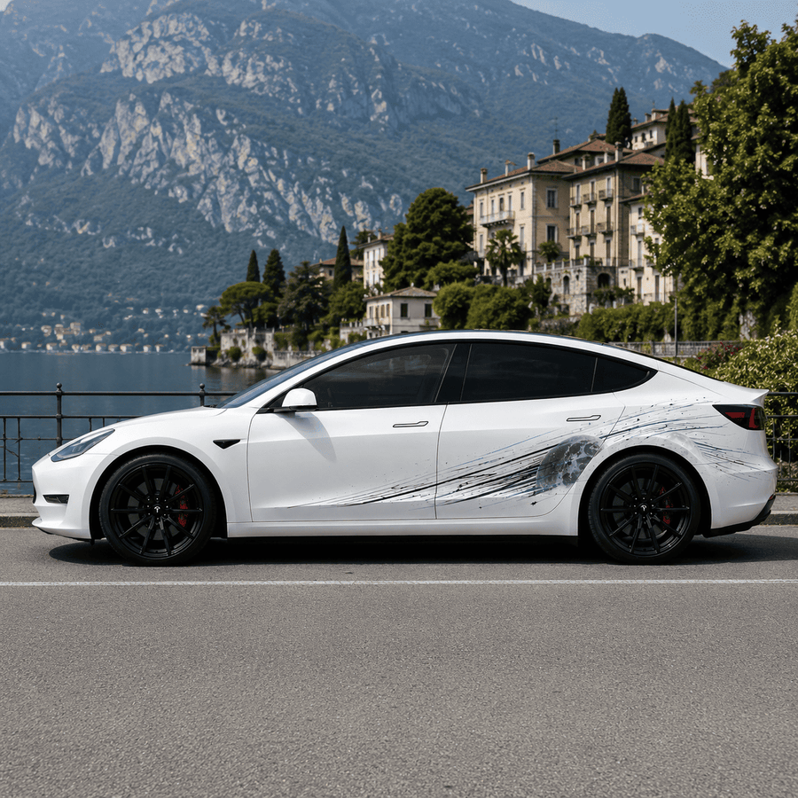 Tesla Model 3 with Lunar Impact moon crater side decal full side view parked by Italian lake with mountain backdrop