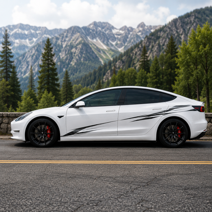 Tesla Model 3 with black slash strike side decal on mountain highway surrounded by pine trees in summer