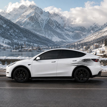 Tesla Model Y black gray patriotic American flag side body decal full side view alpine lake snowy mountain winter background