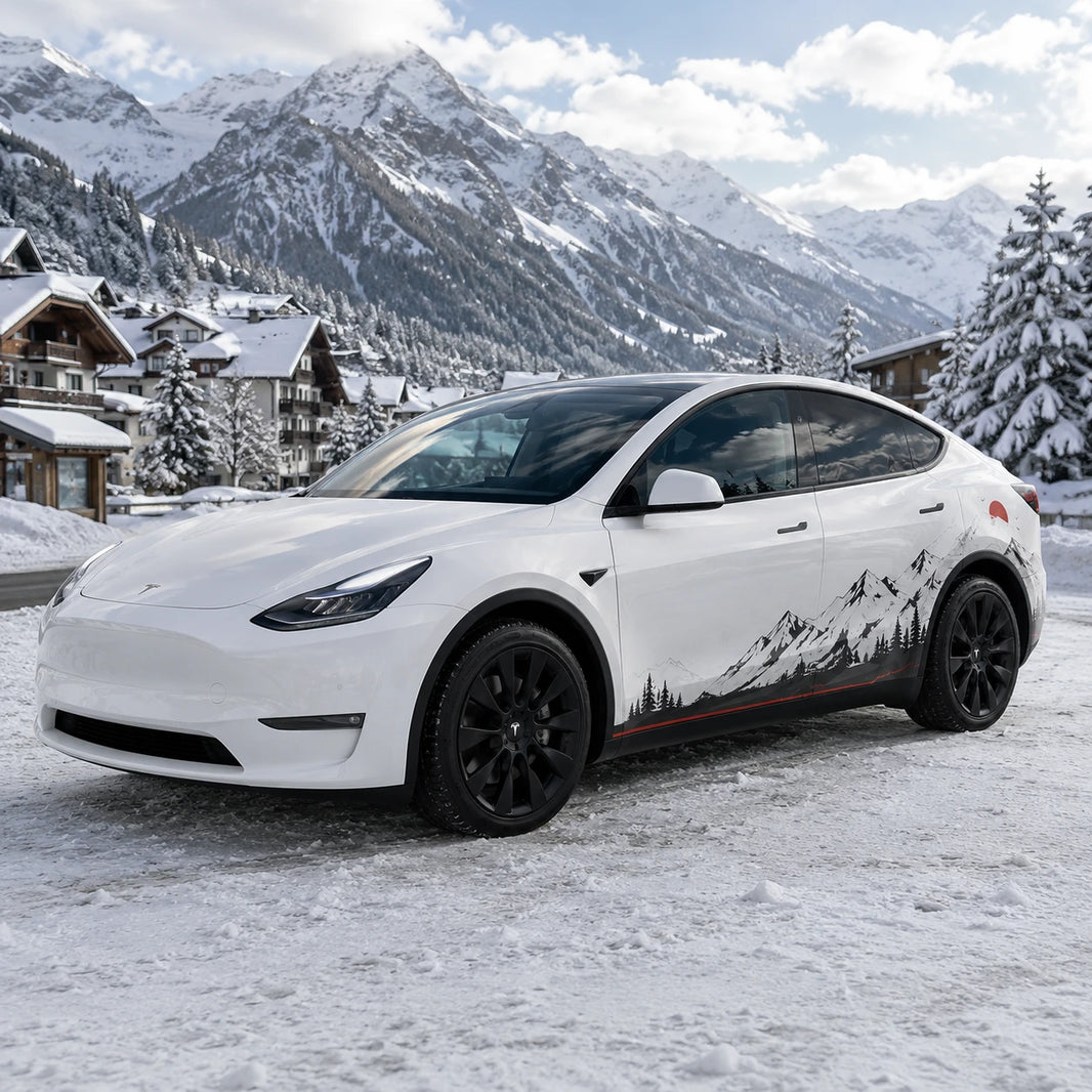 Tesla Model Y mountain forest full side wrap decal front three-quarter view snowy alpine village mountain winter background red sun pine tree silhouette