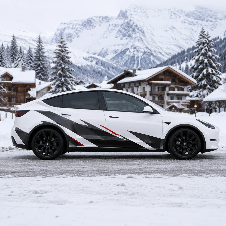 Tesla Model Y black white red racing stripe geometric side wrap full view snowy alpine chalet mountain background
