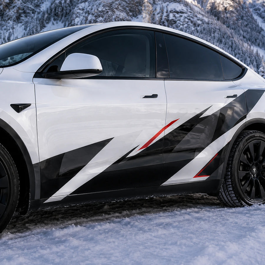 Tesla Model Y geometric racing stripe decal close-up door panel black white red angular design snowy mountain background