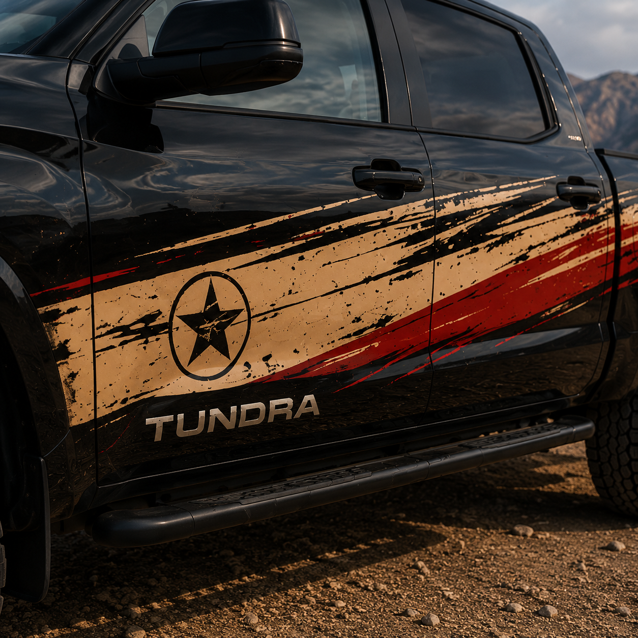 Close-up of distressed American star decal on Toyota Tundra door panel with red and gold brush-stroke racing stripe design