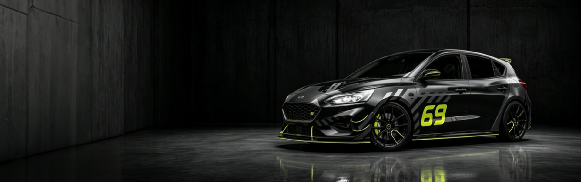 WEEM premium car decals on black racing hatchback with bold vinyl graphics for cars and trucks