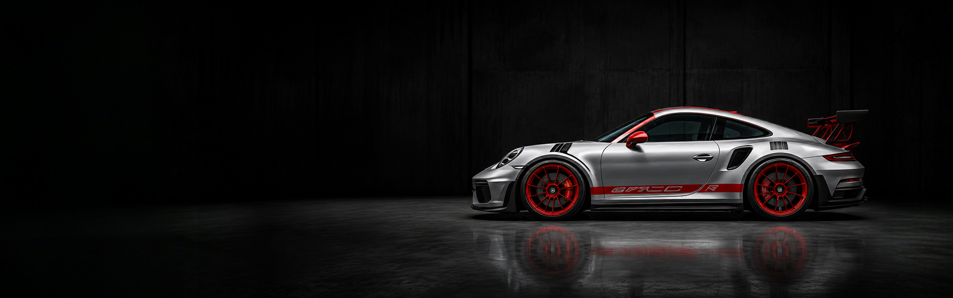 WEEM premium sports car decals with black racing stripes on silver Porsche 911 GT3 RS with red wheels